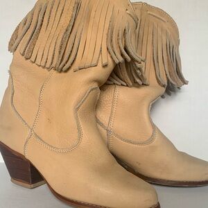 Cowboy leather tan boots with fringe 2” heels mid calf.